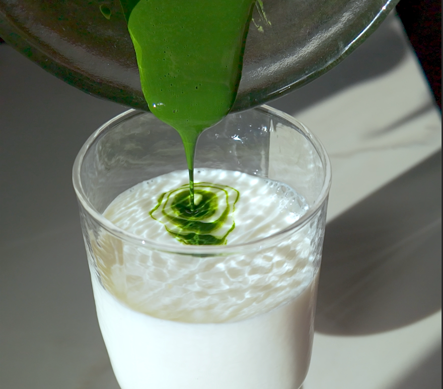 pouring matcha latte