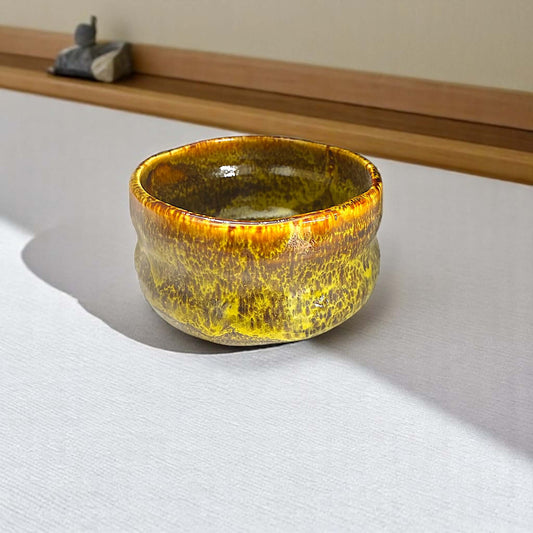 Amber Glaze Matcha Bowl by Nishigama Kiln featuring a unique textured finish