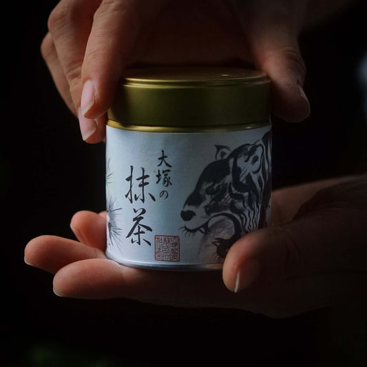 ZENERGY Single Region Ceremonial Matcha in Elegant Container Held by Hands