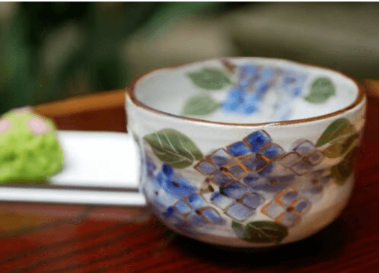 Handcrafted matcha bowl Kyoto with floral design perfect for tea ceremonies