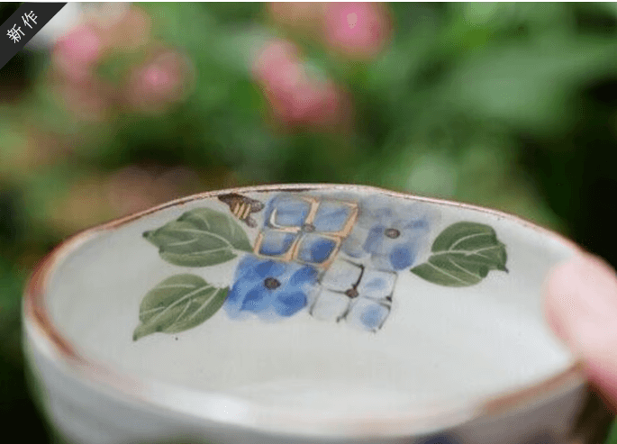 Handcrafted matcha bowl Kyoto featuring a floral design and elegant glaze suitable for tea ceremonies