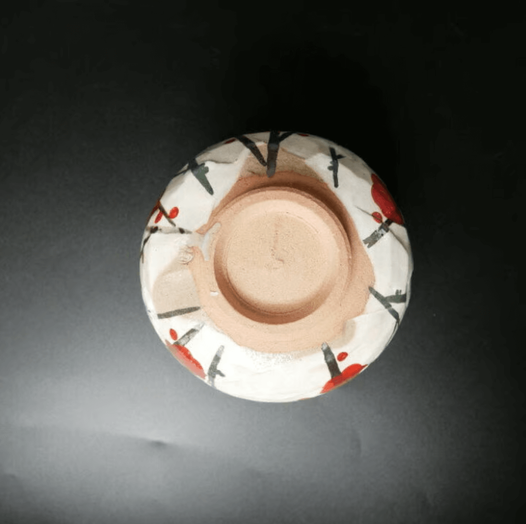 Artistic Japanese matcha bowl with unique hand-painted design for tea enthusiasts